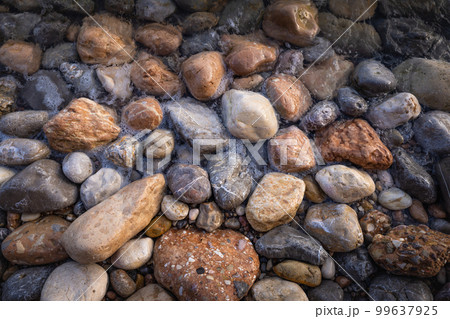 Rocky shapes on the beach. textures and patterns generated on the stones of the Ibiza. Rocky shapes on the beach. textures and patterns generated on the stones of the Ibiza. 99637925