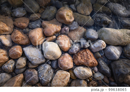 Rocky shapes on the beach. textures and patterns generated on the stones of the Ibiza. 99638065
