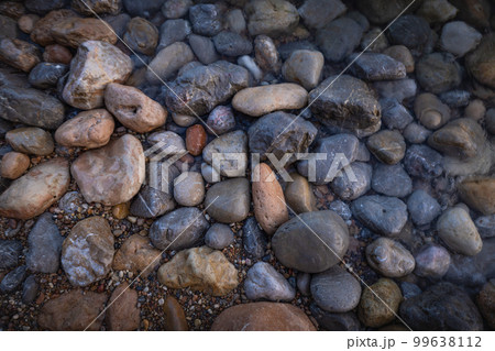 Rocky shapes on the beach. textures and patterns generated on the stones of the Ibiza. Rocky shapes on the beach. textures and patterns generated on the stones of the Ibiza. 99638112