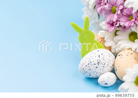 Easter eggs and flower bouquet Easter eggs and flower bouquet 99639755