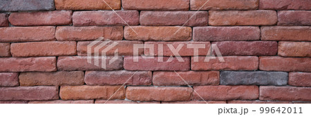 Texture of old red brick wall. Background of empty brick wall basement Texture of old red brick wall. Background of empty brick wall basement 99642011