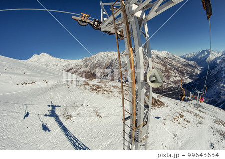 Support tower of an old chairlift with a speaker 99643634