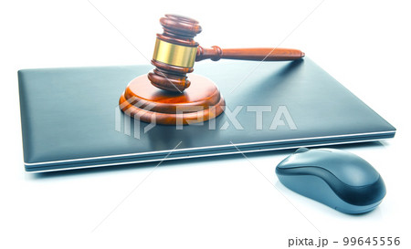 court and auction gavel on laptop background. online law and consultation. 99645556