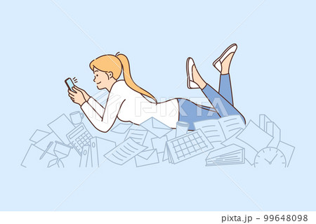 Procrastination woman with phone lies on documents and stationery oblivious to mess 99648098