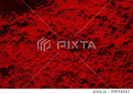 Close-up of organic deep red colored Sindoor or kumkum as background. Herbal gulal or Holi colors. Selective focus. 99648682