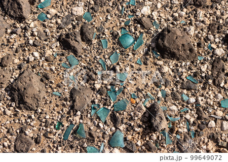 Soil with pieces of broken glass Soil with pieces of broken glass 99649072
