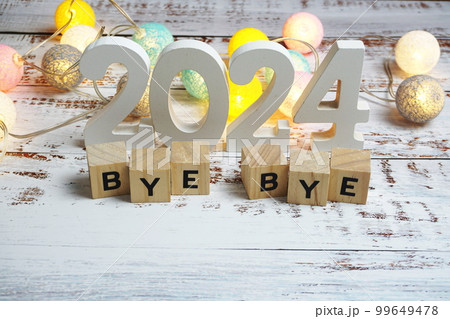 Goodbye 2024 alphabet letters with space copy on wooden background Goodbye 2024 alphabet letters with space copy on wooden background 99649478
