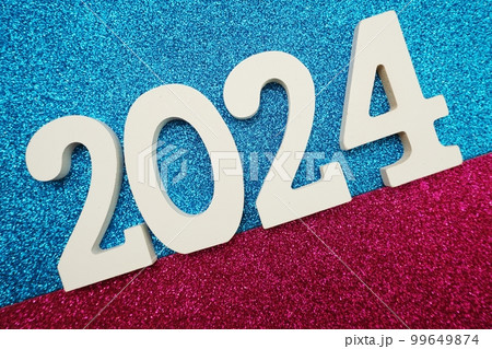 Happy New year 2024 with space copy on pink and blue glitter background Happy New year 2024 with space copy on pink and blue glitter background 99649874