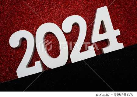 Happy New year 2024 with space copy on red and black glitter background Happy New year 2024 with space copy on red and black glitter background 99649876