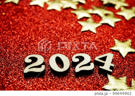 Happy New year 2024 with space copy on red glitter background Happy New year 2024 with space copy on red glitter background 99649902