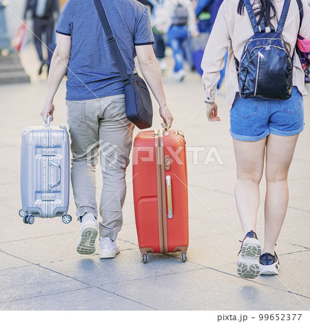 Abstract couple of travelers with luggage, suitcases and backpack, concept of travel and tourism concept 99652377