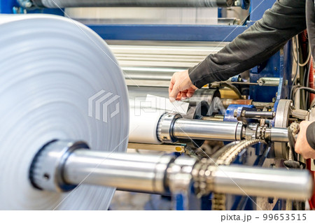 plastic roll in a factory for the production of plastic products plastic roll in a factory for the production of plastic products 99653515