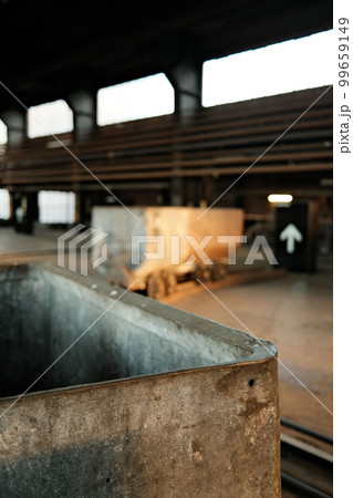 Details of a coal lorry in the sunset, Mine, Ruhr area, Germany Details of a coal lorry in the sunset, Mine, Ruhr area, Germany 99659149