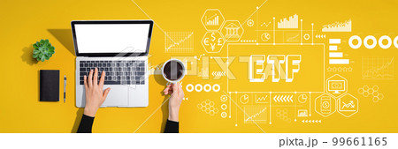 ETF theme with person using laptop computer 99661165