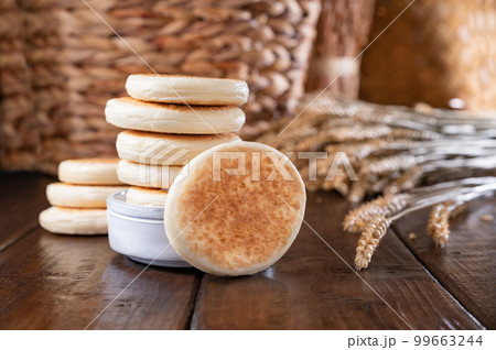 tigelle or crescentine homemade,an Italian food typical of the area of Modena.Thin round breads from tigelle or crescentine homemade,an Italian food typical of the area of Modena.Thin round breads from 99663244