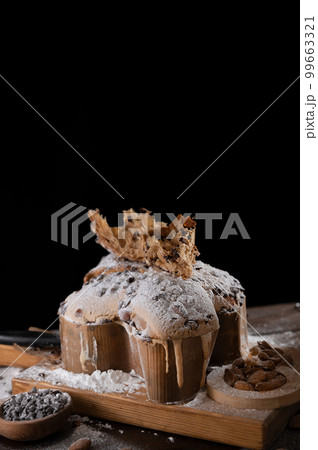 Colomba with chocolate. Easter Italian cake with almonds and chocolate in the shape of a dove.  99663321