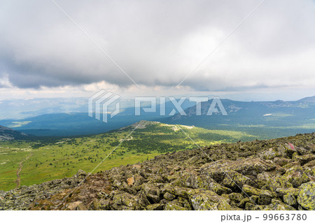 Forests and mountains of the Southern Urals near the village of Tyulyuk in Russia. Drone view. 99663780