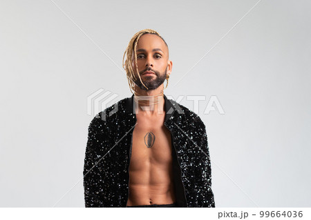 Black latin gay man isolated on white Black latin gay man isolated on white 99664036