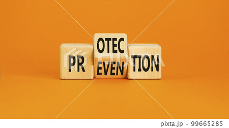 Protection and prevention symbol. Concept word Protection Prevention on wooden cubes. Beautiful orange table orange background. Business and protection and prevention concept. Copy space. Protection and prevention symbol. Concept word Protection Prevention on wooden cubes. Beautiful orange table orange background. Business and protection and prevention concept. Copy space. 99665285