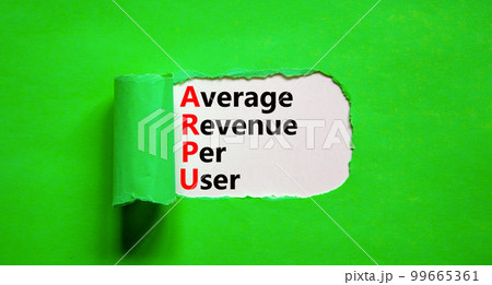 ARPU average revenue per user symbol. Concept words ARPU average revenue per user on white paper on beautiful green background. Business ARPU average revenue per user concept. Copy space. 99665361