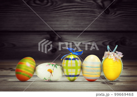 Easter background with colorful easter eggs on wooden background. Easter background with colorful easter eggs on wooden background. 99669468