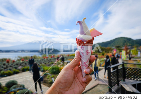 Cute softcream in hand Cute softcream in hand 99674802