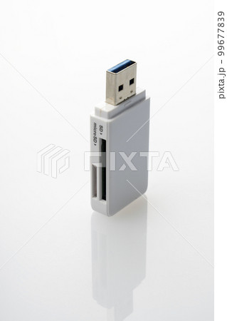white USB card reader close-up on white background 99677839