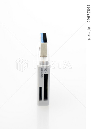 white USB card reader close-up on white background white USB card reader close-up on white background 99677841