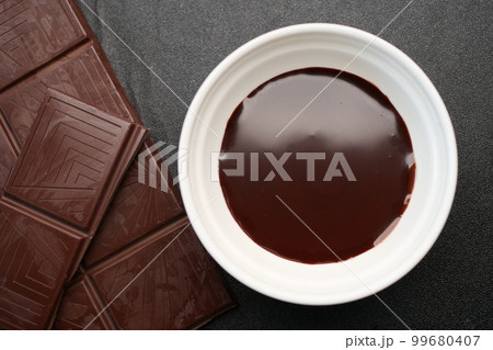 dark chocolate cream in a bowl on white dark chocolate cream in a bowl on white 99680407