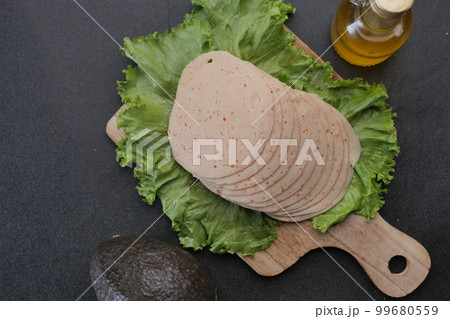salami sausage cut into thin pieces salami sausage cut into thin pieces 99680559