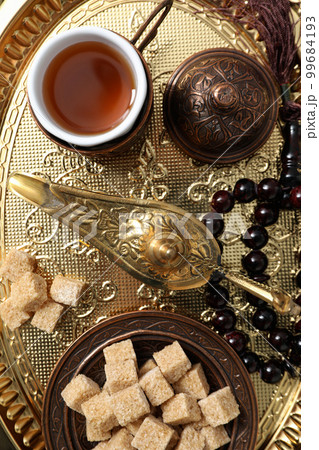 Concept of Muslim holy month Ramadan Kareem, top view Concept of Muslim holy month Ramadan Kareem, top view 99684193