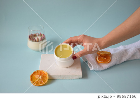 Handmade natural body balm in background pastel Handmade natural body balm in background pastel 99687166