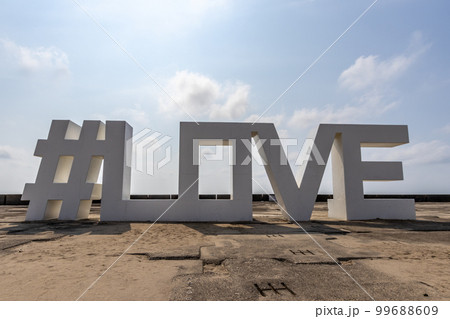 Public art, #love, at Mattou seaside park, Japan. 99688609