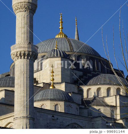 Exterior of mosque against blue sky Exterior of mosque against blue sky 99691144