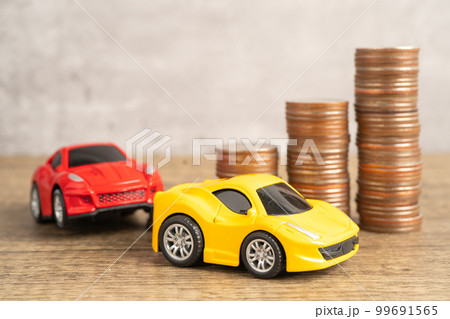 Bangkok, Thailand, July 1, 2022 Car and coins, Car loan, Finance, saving money, insurance and leasing time concepts. Bangkok, Thailand, July 1, 2022 Car and coins, Car loan, Finance, saving money, insurance and leasing time concepts. 99691565