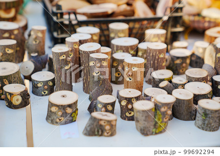 small logs with painted faces. cute souvenirs and crafts made. 99692294