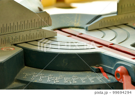 ruler of electric circular saw, cutting piece of wood. trimming saw. 99694294