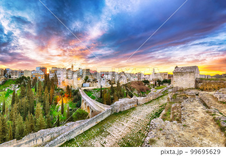 Fabulous view on Gravina in Puglia ancient town, bridge and canyon at sunris 99695629