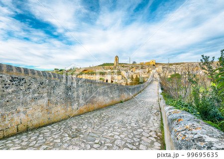 Breathtaking view on Gravina in Puglia ancient town, bridge and canyon at sunris 99695635