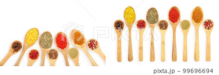 mix of spices in wooden spoon isolated on a white background with copy space for your text.. Top view. Flat lay. Set or collection 99696694