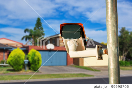 Security camera closeup on the property 99698706