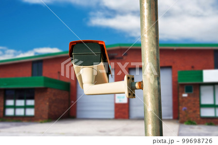 Security camera closeup on the property 99698726