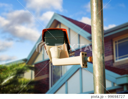 Security camera closeup on the property 99698727