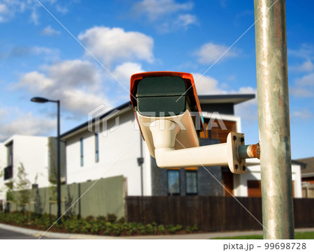 Security camera closeup on the property 99698728