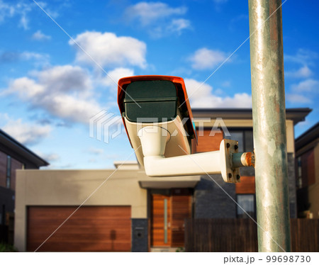 Security camera closeup on the property 99698730