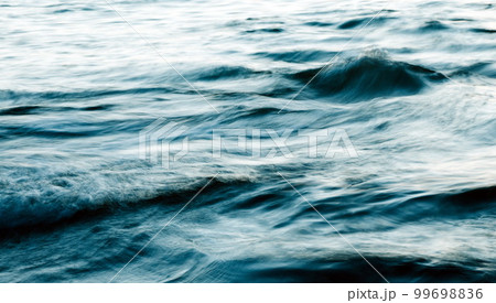 Long exposure water closeup in sea 99698836