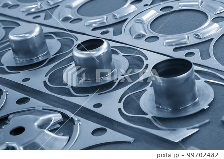 The close up scene of product parts from progressive die. 99702482