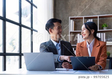 Business team meeting to conference discussing working analyzing with financial data and marketing business strategy project, presentation and brainstorming to making new project 99705625