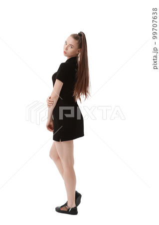 rear view.beautiful woman model in short black dress .isolated on white 99707638