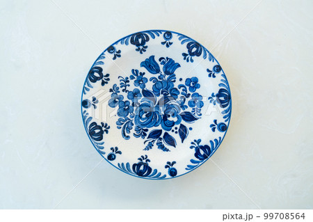 beautiful vintage porcelain plate on table beautiful vintage porcelain plate on table 99708564